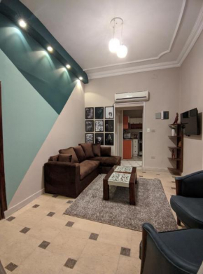 Apartment overlooking a garden with a private entrance